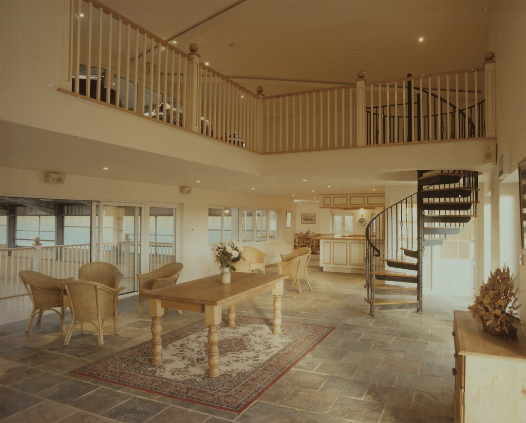 The Unicorn clubhouse interior with spiral staircase and mezzanine